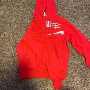 A red Coca-Cola champion hoodie